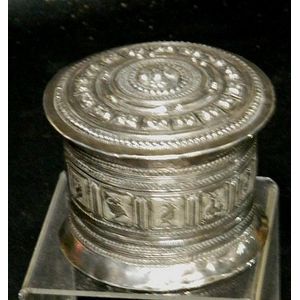 A Burmese silver box, early 20th century, repousse silver…