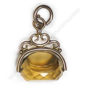 An Edwardian 9ct gold citrine fob spinner, the facetted&hellip;