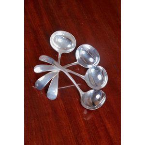 Four silver-plated sauce ladles in the Old English pattern