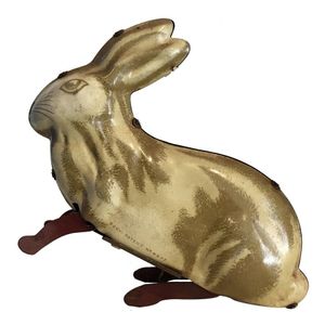 A collection of tin toys, including a Jumping rabbit (Made in…