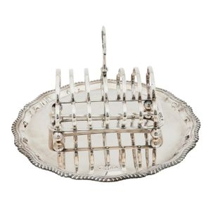 An Elizabeth II silver salver and a Victorian silver toast rack,…
