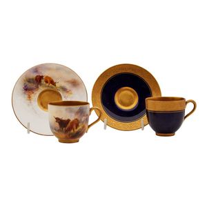 Two Royal Worcester coffee cups and saucers, one painted with…