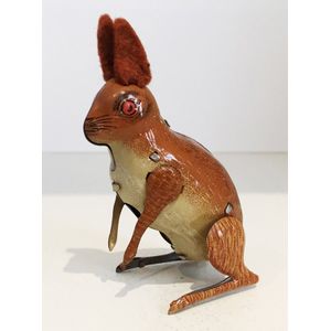 A collection of tin toys, including a wind-up Rabit by Kohler,…