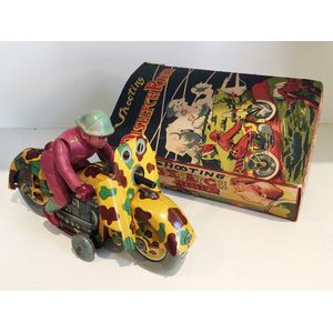 A rare wind-up Shooting Dispatch motorcycle rider tin toy, made…