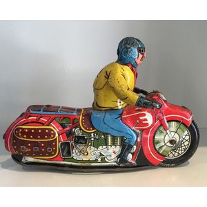 A Super Cycle motorcycle racer friction tin toy, made in…