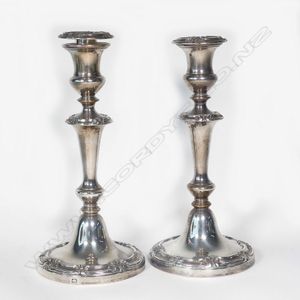 A pair of antique Old Sheffield Plate candlesticks, campana…