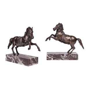 A good pair of finely cast bronze models of prancing horses,…