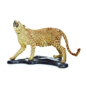 A vintage full mount taxidermy leopard, standing in a snarling…