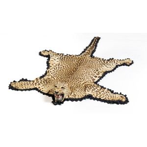A leopard skin rug with taxidermy head (missing ears), felt…