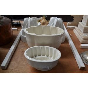 Two antique ceramic jelly moulds along with two other examples…