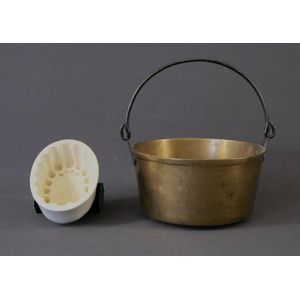 Two various kitchen items, including early brass jam cooking…