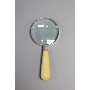 Desk magnifying glass, with an antique ivory handle, silver…