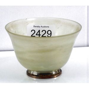 Russian carved stone bowl on silver mount, the mount stamped…