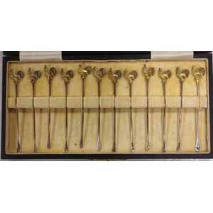 Boxed set of sterling silver cocktail sticks, with rooster tops,…