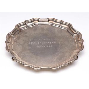A sterling silver salver inscribed 'Johnson & Johnson…