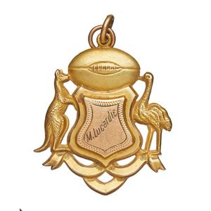 A 9ct gold pendant fob by Willis, in the form of a coat of arms,…