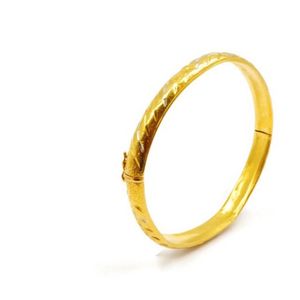 Oriental high carated gold hinged bangle marked 900, width 7 mm ...