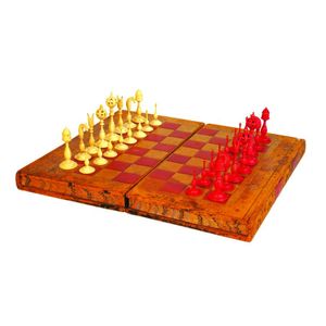 An Indian 18th century style ivory chess set, natural and red…