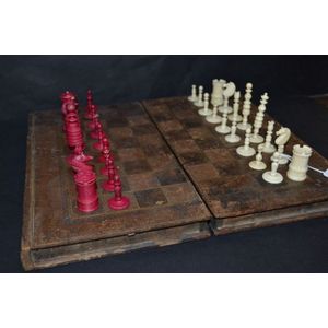 Antique ivory chess set in a leather bound folding case (some…