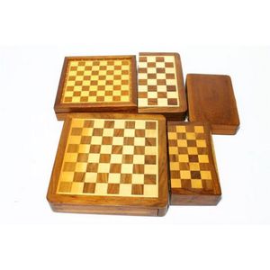 Five timber inlay travelling chess sets including one…
