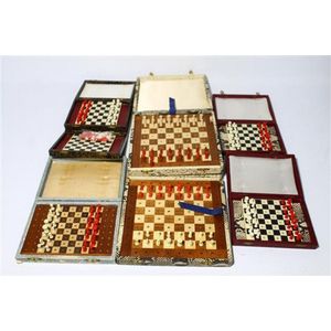 Seven Jacques travelling chess sets, three faux crocodile skin…