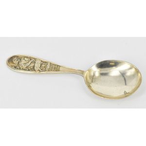 A sterling silver baby spoon, featuring 'Mary had a little…