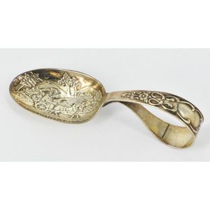A sterling silver baby spoon, featuring 'This little pig went…