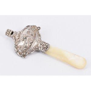 A Victorian sterling silver baby rattle, mother-of-pearl handle,…
