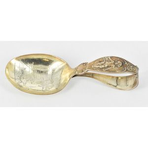 An American sterling silver baby spoon, featuring farm animals.…