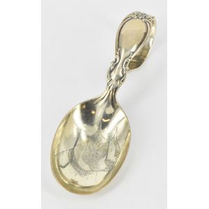 An American sterling silver baby spoon, featuring a Boston…