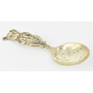 An American sterling silver baby spoon, dog shaped handle,…
