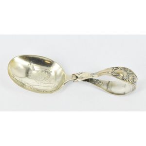An American sterling silver baby spoon, featuring Who Killed…