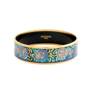 Hermes, enamel bangle, styled in a blue and tonal enamel with ...