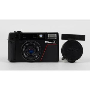 Nippon Kogaku: 1983 Nikon L35 Af point-and-shoot camera…