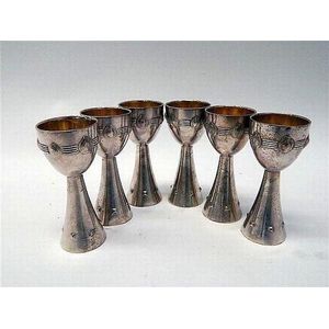 A set of six Art Deco silver plate toasting goblets with gilt…