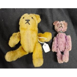 Two vintage miniature teddy bears, one ear missing from one