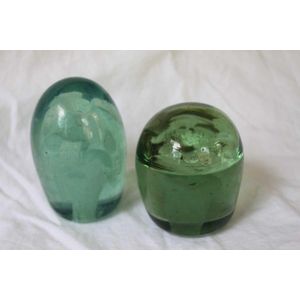 Two Green Nailsea glass dump weights, 19th century, tallest: 12…