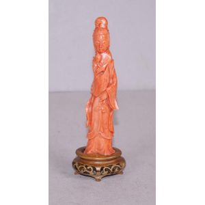 Chinese carved coral Guan Yin figure on carved wood stand.&hellip;