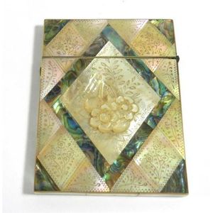 A Victorian mother of pearl & paua shell carved calling card…