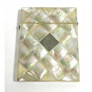 A Victorian mother of pearl & sterling silver carved calling…