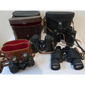 Four cased sets of vintage binoculars includes Zenith and…