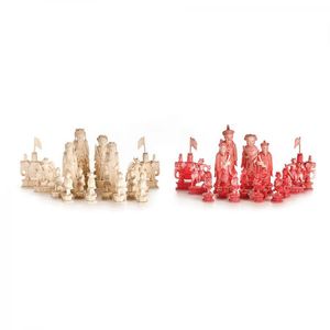A Chinese Cantonese ivory figural chess set, a red-stained and…