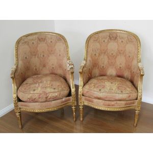 Antique pair of French Louis XV bergère chairs.