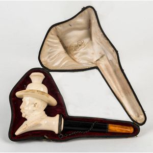 A fine carved meerschaum figured pipe in plush fitted box, 19th…