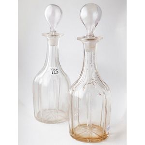 Pair Victorian bottle decanters, faceted stems, rib cut with…