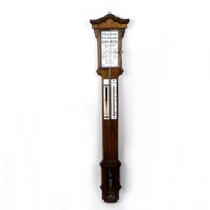 A good Victorian walnut stick barometer, with milk glass panel…