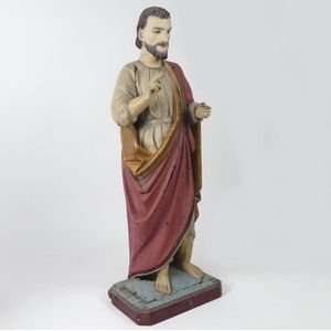 A large antique wooden statue of St. James The Greater, painted…