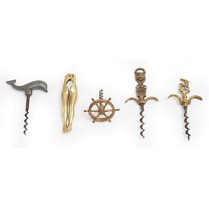 Four novelty corkscrews and a nutcracker 20th century,…
