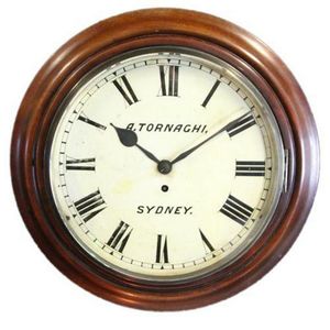 Angelo Tornaghi wall clock from the Lands Title Office having a…