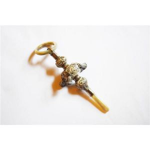 A sterling silver babies rattle, with whistle and four silver…